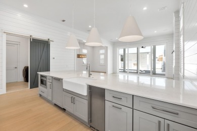 This exceptional Topsail Plan by Cole Construction offers luxury on Origins Golf Club in Florida - for sale on GolfHomes.com, golf home, golf lot