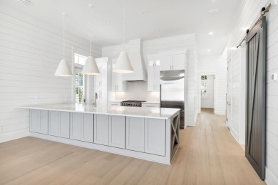 This exceptional Topsail Plan by Cole Construction offers luxury on Origins Golf Club in Florida - for sale on GolfHomes.com, golf home, golf lot