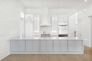 This exceptional Topsail Plan by Cole Construction offers luxury on Origins Golf Club in Florida - for sale on GolfHomes.com, golf home, golf lot
