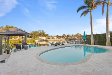 Experience the pinnacle of waterfront living in Dana Shores on Rocky Point Golf Course in Florida - for sale on GolfHomes.com, golf home, golf lot