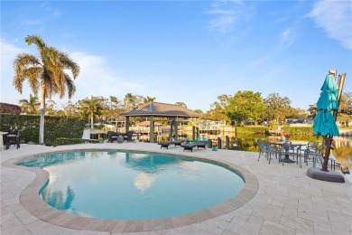 Experience the pinnacle of waterfront living in Dana Shores on Rocky Point Golf Course in Florida - for sale on GolfHomes.com, golf home, golf lot