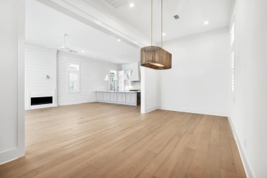 This exceptional Topsail Plan by Cole Construction offers luxury on Origins Golf Club in Florida - for sale on GolfHomes.com, golf home, golf lot