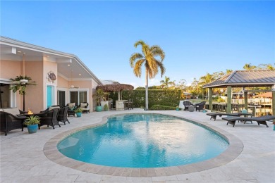 Experience the pinnacle of waterfront living in Dana Shores on Rocky Point Golf Course in Florida - for sale on GolfHomes.com, golf home, golf lot