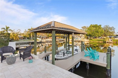 Experience the pinnacle of waterfront living in Dana Shores on Rocky Point Golf Course in Florida - for sale on GolfHomes.com, golf home, golf lot