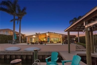 Experience the pinnacle of waterfront living in Dana Shores on Rocky Point Golf Course in Florida - for sale on GolfHomes.com, golf home, golf lot