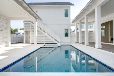 This exceptional Topsail Plan by Cole Construction offers luxury on Origins Golf Club in Florida - for sale on GolfHomes.com, golf home, golf lot