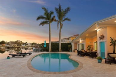 Experience the pinnacle of waterfront living in Dana Shores on Rocky Point Golf Course in Florida - for sale on GolfHomes.com, golf home, golf lot