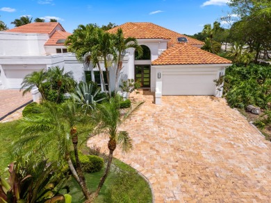 Gorgeous renovated one story home with wonderful patio/pool on Woodfield Country Club in Florida - for sale on GolfHomes.com, golf home, golf lot