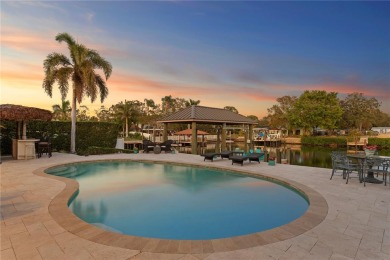 Experience the pinnacle of waterfront living in Dana Shores on Rocky Point Golf Course in Florida - for sale on GolfHomes.com, golf home, golf lot