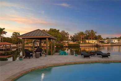 Experience the pinnacle of waterfront living in Dana Shores on Rocky Point Golf Course in Florida - for sale on GolfHomes.com, golf home, golf lot