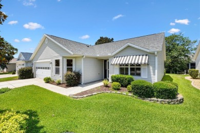 This beautiful Wisteria Style Designer Home in the Village of on Glenview Championship Golf and Country Club in Florida - for sale on GolfHomes.com, golf home, golf lot