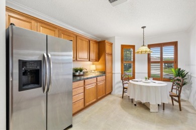 This beautiful Wisteria Style Designer Home in the Village of on Glenview Championship Golf and Country Club in Florida - for sale on GolfHomes.com, golf home, golf lot