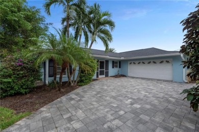 Welcome to this charming 3-bedroom, 2-bathroom pool home located on LaPlaya Golf Club in Florida - for sale on GolfHomes.com, golf home, golf lot