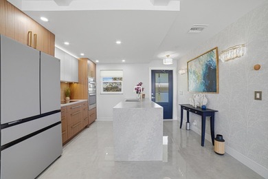 TOTALLY REMODELED First Floor Condo in a very active 55+ Golf on Leisureville Community Golf Course in Florida - for sale on GolfHomes.com, golf home, golf lot