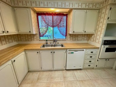 This home has been well maintained by the owners of over 30 on Water Oak Country Club Estates in Florida - for sale on GolfHomes.com, golf home, golf lot