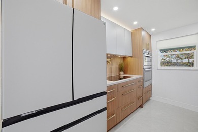 TOTALLY REMODELED First Floor Condo in a very active 55+ Golf on Leisureville Community Golf Course in Florida - for sale on GolfHomes.com, golf home, golf lot