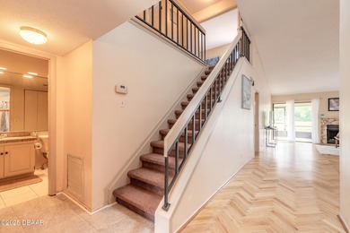 Welcome to this inviting 3-bedroom, 2.5-bathroom townhome on The Club At Pelican Bay - North Course in Florida - for sale on GolfHomes.com, golf home, golf lot