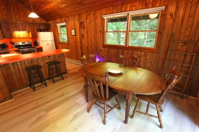 This home is perfect if you like wood.  The lot is loaded with on Hermitage Club Golf Course in Vermont - for sale on GolfHomes.com, golf home, golf lot