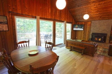 This home is perfect if you like wood.  The lot is loaded with on Hermitage Club Golf Course in Vermont - for sale on GolfHomes.com, golf home, golf lot