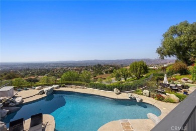 This home is a WOW in every sense of the word!!!  A carpet of on Anaheim Hills Golf Course in California - for sale on GolfHomes.com, golf home, golf lot