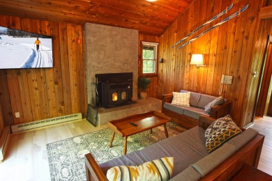 This home is perfect if you like wood.  The lot is loaded with on Hermitage Club Golf Course in Vermont - for sale on GolfHomes.com, golf home, golf lot