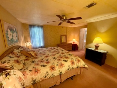 This home has been well maintained by the owners of over 30 on Water Oak Country Club Estates in Florida - for sale on GolfHomes.com, golf home, golf lot