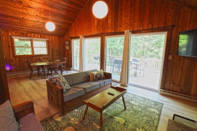 This home is perfect if you like wood.  The lot is loaded with on Hermitage Club Golf Course in Vermont - for sale on GolfHomes.com, golf home, golf lot