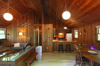 This home is perfect if you like wood.  The lot is loaded with on Hermitage Club Golf Course in Vermont - for sale on GolfHomes.com, golf home, golf lot