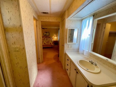 This home has been well maintained by the owners of over 30 on Water Oak Country Club Estates in Florida - for sale on GolfHomes.com, golf home, golf lot