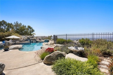 This home is a WOW in every sense of the word!!!  A carpet of on Anaheim Hills Golf Course in California - for sale on GolfHomes.com, golf home, golf lot