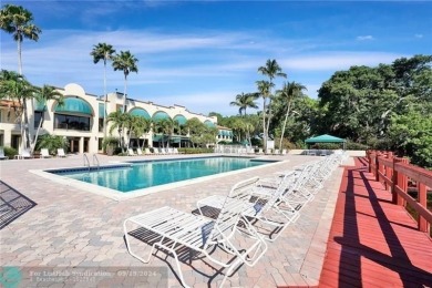 Must see rarely available Top floor 2/2 end unit on the golf on Pine Island Ridge Country Club in Florida - for sale on GolfHomes.com, golf home, golf lot