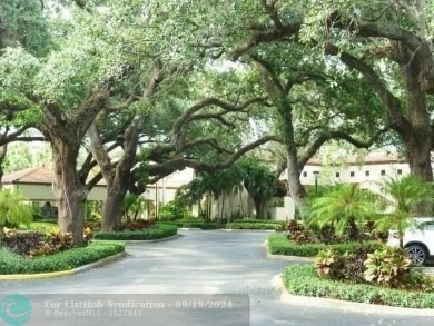 Must see rarely available Top floor 2/2 end unit on the golf on Pine Island Ridge Country Club in Florida - for sale on GolfHomes.com, golf home, golf lot