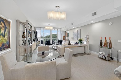 Dazzling golf and sparkling lake views await in this stunning on Boca West Golf and Country Club in Florida - for sale on GolfHomes.com, golf home, golf lot