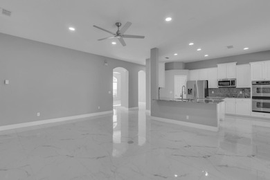 This well-appointed residence offers an excellent opportunity to on North Shore Golf Club in Florida - for sale on GolfHomes.com, golf home, golf lot