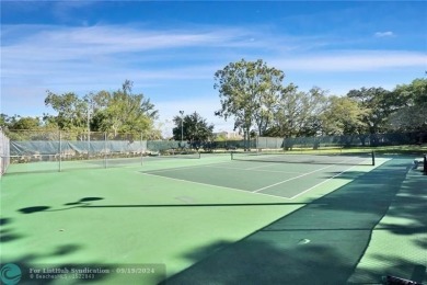 Must see rarely available Top floor 2/2 end unit on the golf on Pine Island Ridge Country Club in Florida - for sale on GolfHomes.com, golf home, golf lot