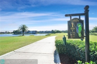 Must see rarely available Top floor 2/2 end unit on the golf on Pine Island Ridge Country Club in Florida - for sale on GolfHomes.com, golf home, golf lot