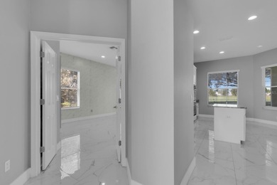 This well-appointed residence offers an excellent opportunity to on North Shore Golf Club in Florida - for sale on GolfHomes.com, golf home, golf lot