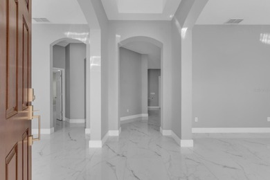 This well-appointed residence offers an excellent opportunity to on North Shore Golf Club in Florida - for sale on GolfHomes.com, golf home, golf lot