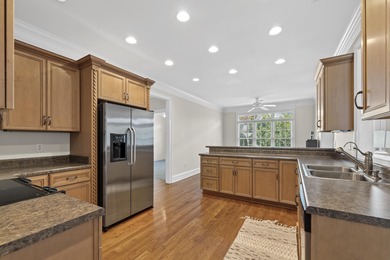 Charming 3-bedroom, 2.5-bath home located in the desirable on Harbor Club Golf and Country Club in Georgia - for sale on GolfHomes.com, golf home, golf lot