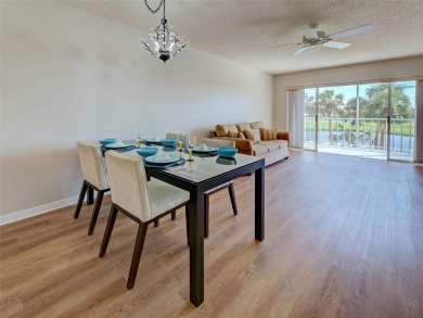 Beautifully RENOVATED and FRESHLY PAINTED condo with GOLF AND on Plantation Golf and Country Club in Florida - for sale on GolfHomes.com, golf home, golf lot