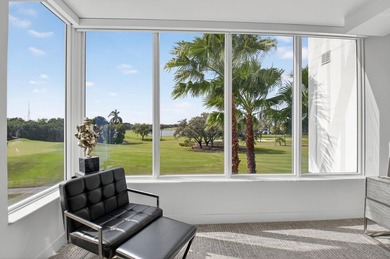 Dazzling golf and sparkling lake views await in this stunning on Boca West Golf and Country Club in Florida - for sale on GolfHomes.com, golf home, golf lot