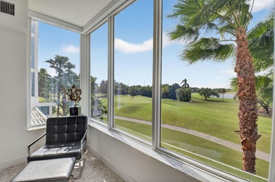 Dazzling golf and sparkling lake views await in this stunning on Boca West Golf and Country Club in Florida - for sale on GolfHomes.com, golf home, golf lot