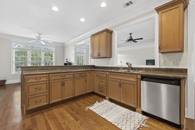 Charming 3-bedroom, 2.5-bath home located in the desirable on Harbor Club Golf and Country Club in Georgia - for sale on GolfHomes.com, golf home, golf lot