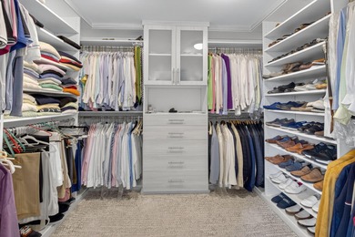 Dazzling golf and sparkling lake views await in this stunning on Boca West Golf and Country Club in Florida - for sale on GolfHomes.com, golf home, golf lot