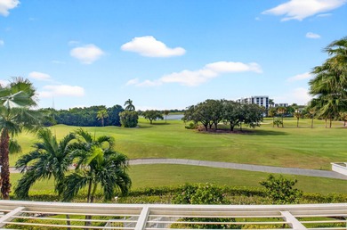 Dazzling golf and sparkling lake views await in this stunning on Boca West Golf and Country Club in Florida - for sale on GolfHomes.com, golf home, golf lot
