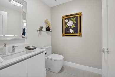 Dazzling golf and sparkling lake views await in this stunning on Boca West Golf and Country Club in Florida - for sale on GolfHomes.com, golf home, golf lot