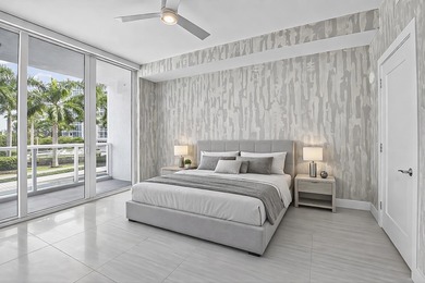 Dazzling golf and sparkling lake views await in this stunning on Boca West Golf and Country Club in Florida - for sale on GolfHomes.com, golf home, golf lot