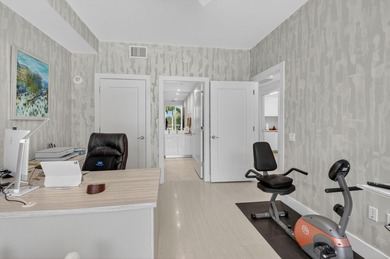 Dazzling golf and sparkling lake views await in this stunning on Boca West Golf and Country Club in Florida - for sale on GolfHomes.com, golf home, golf lot