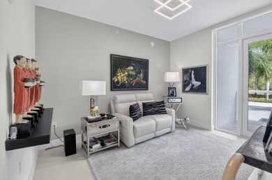 Dazzling golf and sparkling lake views await in this stunning on Boca West Golf and Country Club in Florida - for sale on GolfHomes.com, golf home, golf lot