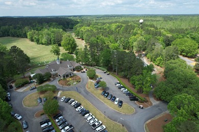 Charming 3-bedroom, 2.5-bath home located in the desirable on Harbor Club Golf and Country Club in Georgia - for sale on GolfHomes.com, golf home, golf lot